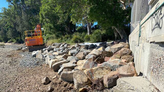 AT WORK: Construction of the new revetment rock wall at Soldiers Point. Picture: Port Stephens Council