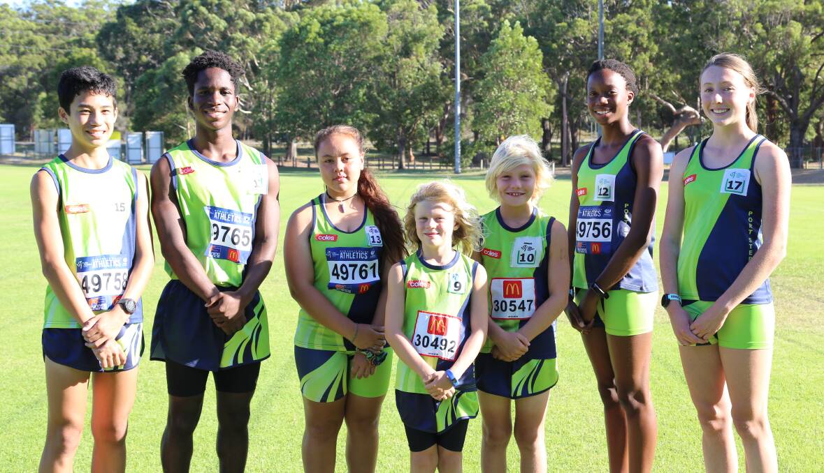 GOOD FORM: Port Stephens Athletic Club members, from left, Caleb Reungkitchaya, 14, Tich Chigweremba, 16, Lily Mullane, 12, Zeke Hay, 8, Will Hoffman, 9, Shari Hurdman, 12, and Emma Cotton, 15. Picture: Ellie-Marie Watts