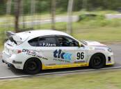 ACTION: Peter Akers in his 2011 Subaru WRX hatchback. He is one of 12 MG Car Club Newcastle members racing in the state championship on August 7. Picture: Robert Hawkins