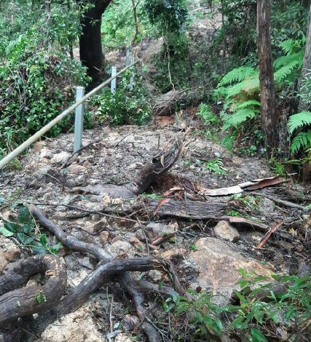 DON'T PASS: The landslip on Tomaree Headland summit track caused by the severe rain event in March. Pictures: National Parks and Wildlife Service
