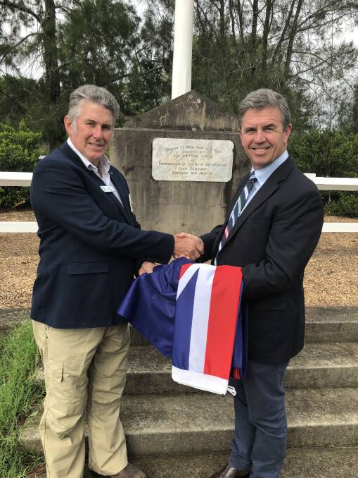 Lieutenant Commander Alan Earle RAN (retired) with Dr David Gillespie, the federal member for Lye, at the Knitting Circle memorial in Seaham on Friday. Picture: Supplied