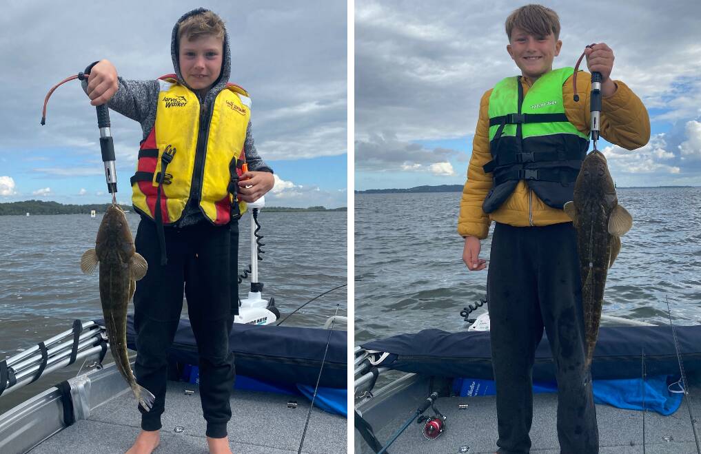 GOOD HAUL: Harrison Marklew, 9, and big brother Charlie, 12, caught these cracker flathead at Soldiers Point. It's surely a fishing trip they'll remember.