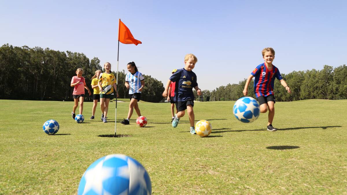 RUN: Kids having fun with FootGolf at Horizons. The golf course is hosting the FootGolf Asia Cup and World Tour from November 18. Picture: Ellie-Marie Watts