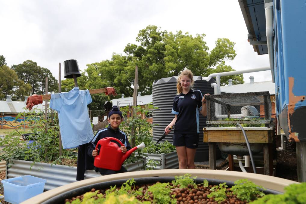 Raymond Terrace Public School Year 6 students and school captains Gurkiat Singh and Kaylee Blundell in the garden. Pictures: Ellie-Marie Watts