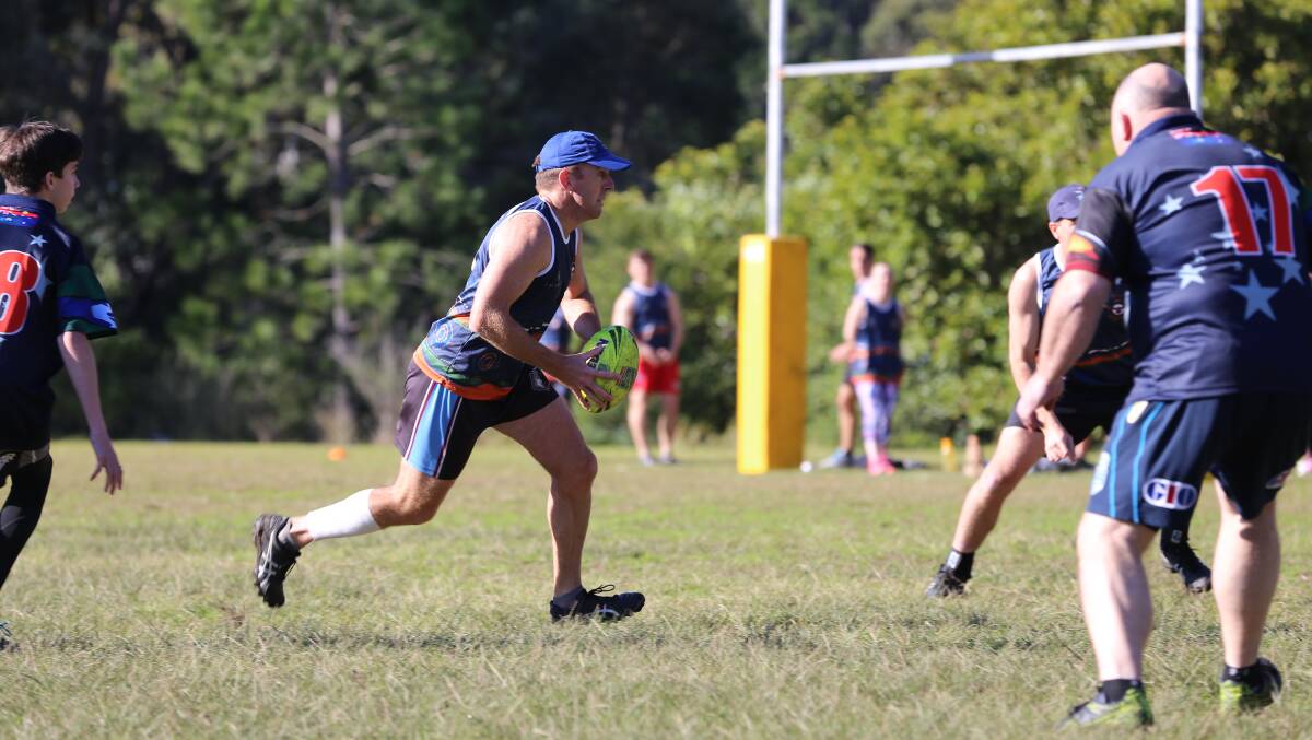 Scenes from Thursday morning at Boyd Oval. Port Stephens Council v Police in the NAIDOC Week Touch Football Championship. RAAF (singlet) v Police (shirt). Picture: Ellie-Marie Watts