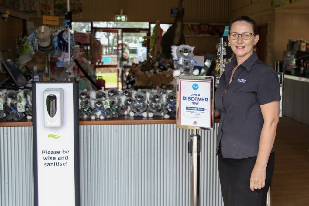 Oakvale Wildlife Park business development manager Elyss Larkham with the Dine and Discover NSW signage.