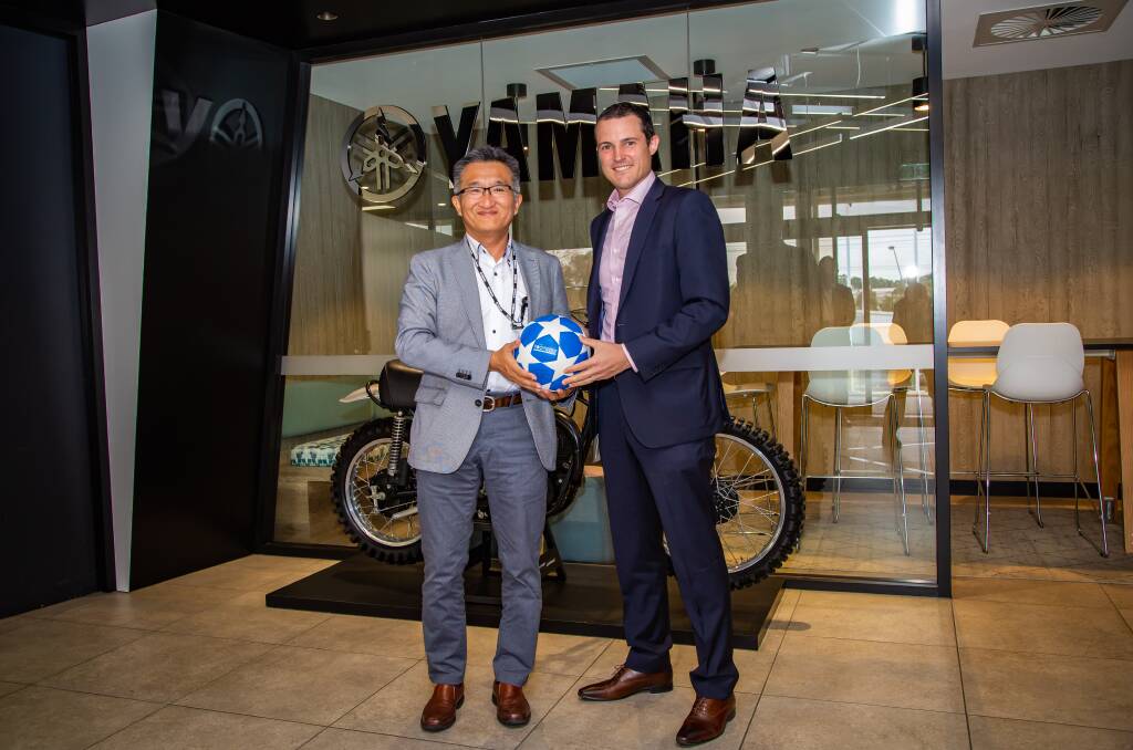 Yamaha Motor Australia director Taka Kaieda with FootGolf Australia president Leonardo Fernandez. 