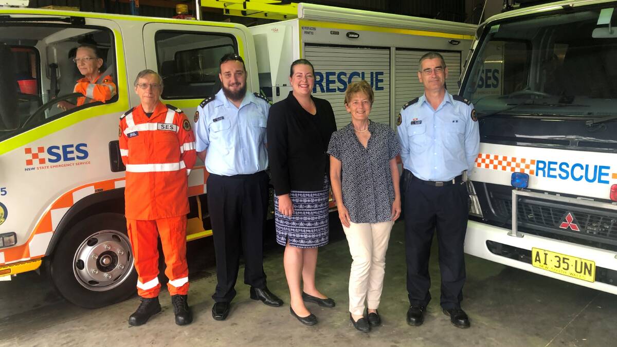 FUNDING: Port Stephens SES Unit members Cheryl Morris, Bruce Gendre, David Douglas and Phil Hudson with Jaimie Abbott, centre, and Catherine Cusack.