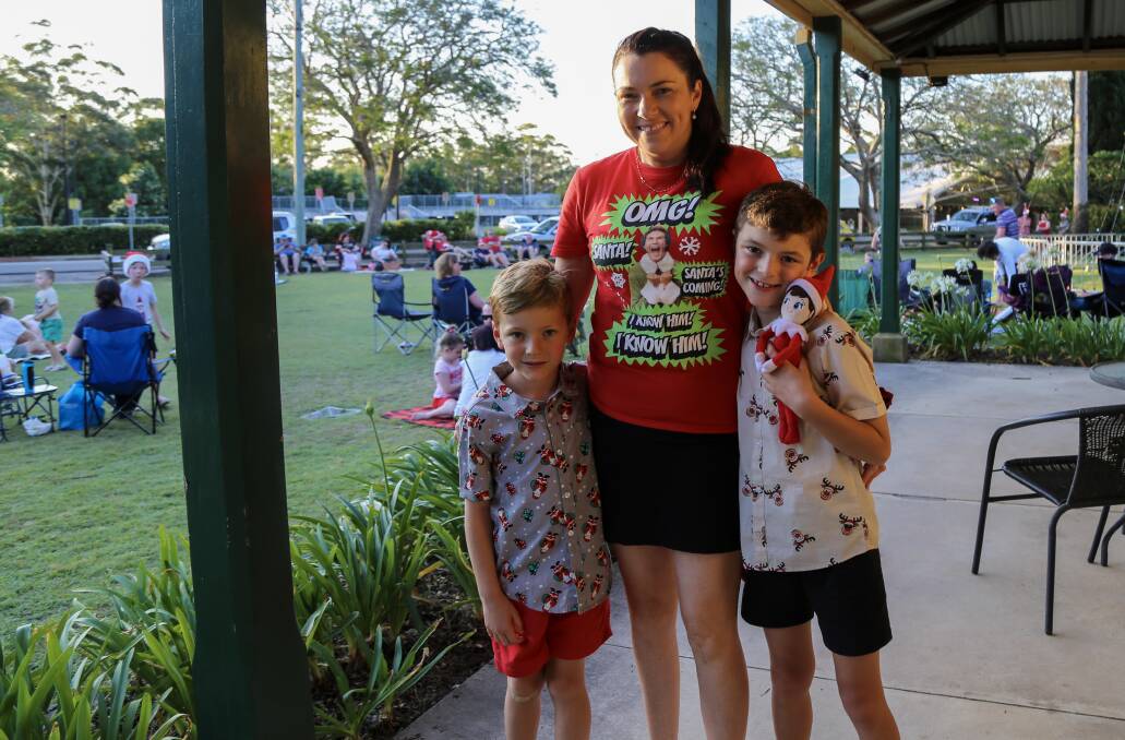 JOY: A family at last year's Carols Under the Christmas Tree event, which returns Friday, December 6.