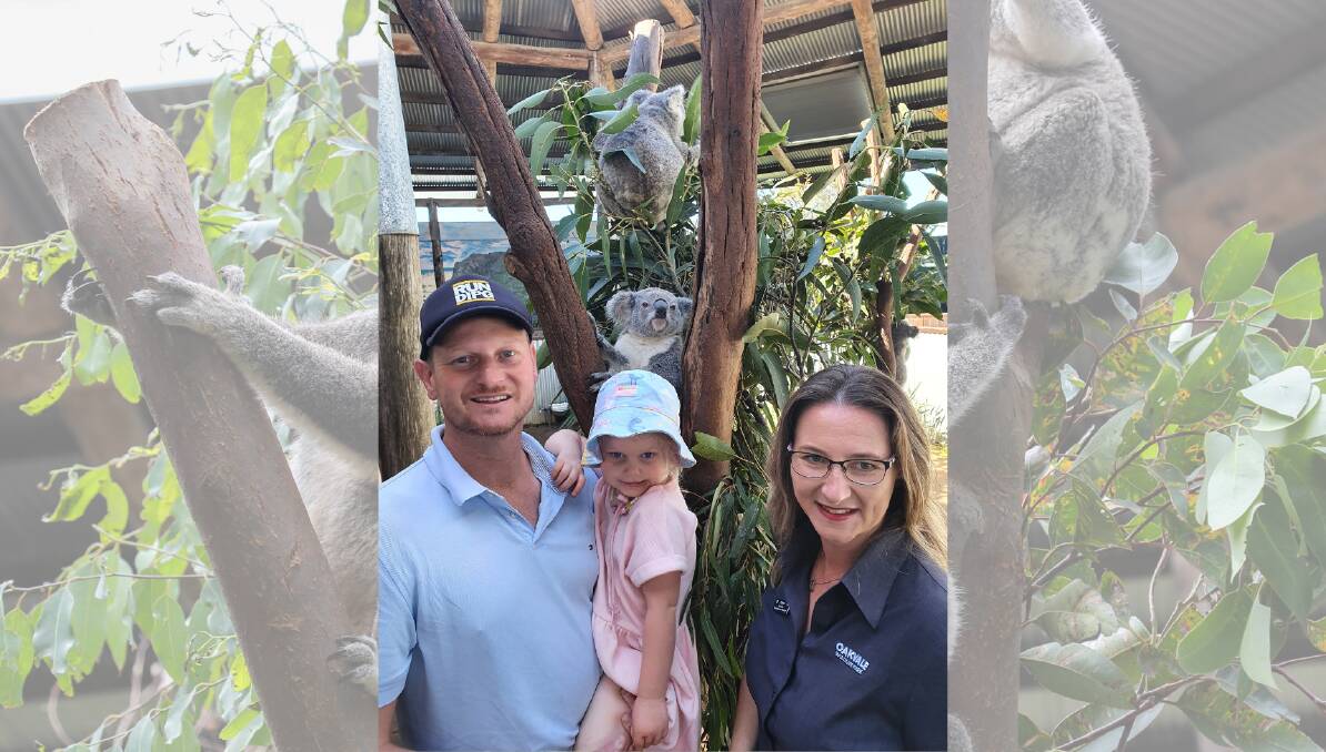 GIVING: Elyss Larkham with Troy and his daughter from Run DIPG, one of three charities Oakvale is supporting through the Pay Discover Forward scheme. 