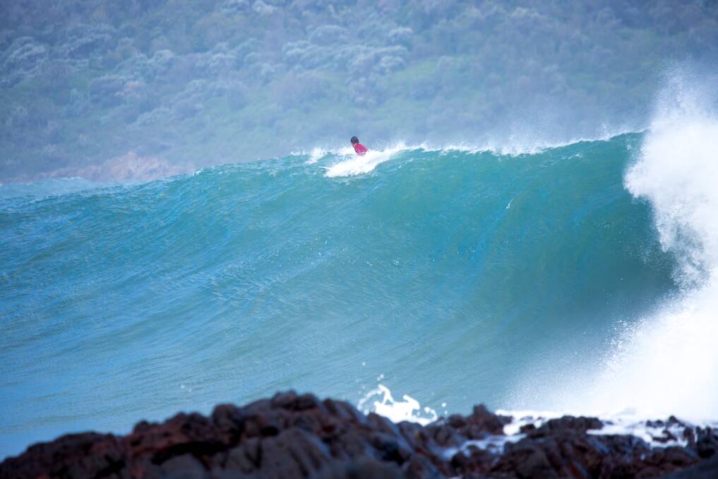 Chris Hasson on a wave at Fingal Beach on Tuesday. Picture: Brent Mail