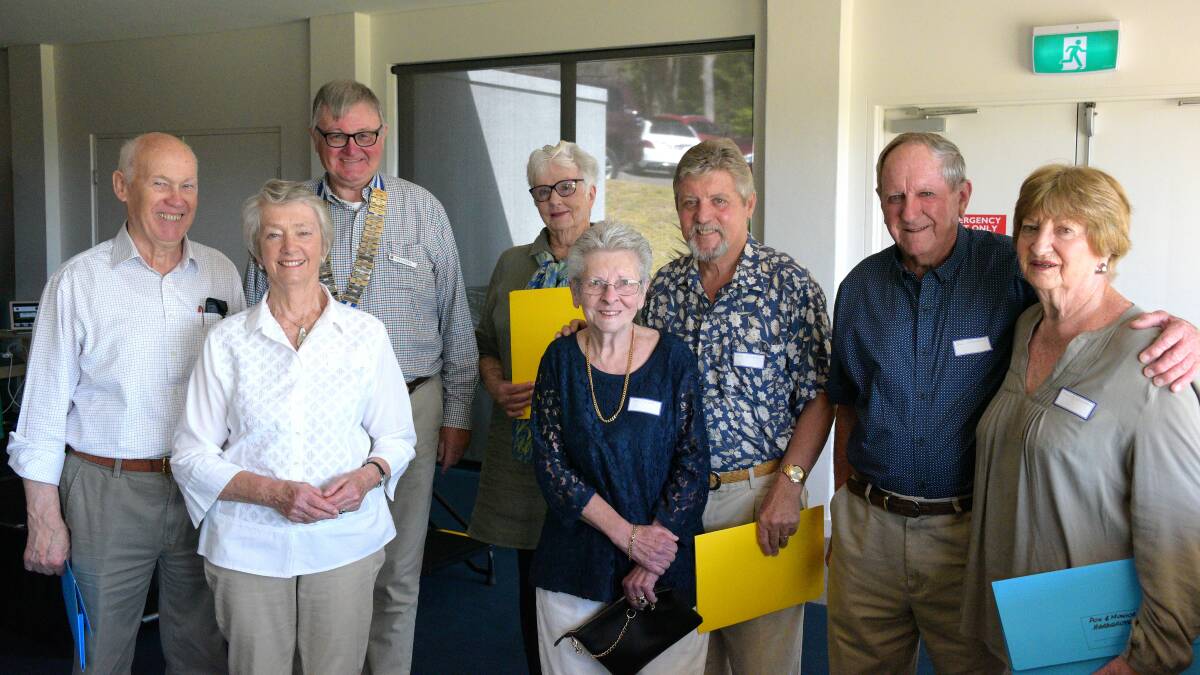 ALL SMILES: Port Stephens Probus Club president David Wilson with new members.