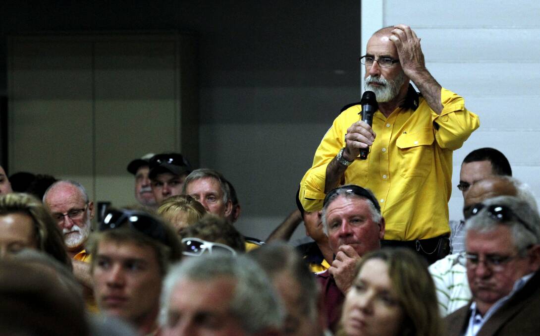 Lou Cassar, then a group officer for RFS Lower Hunter Zone, speaking at a public meeting in Williamtown in December 2013 which was called together to discuss the issue of hazard reduction after the bushfires in Port Stephens in October 2013.