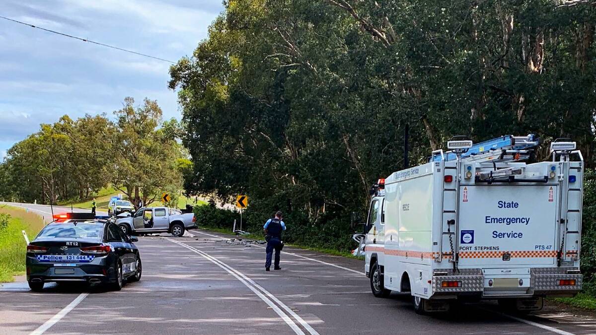 A man died, another was seriously injured and three other passengers, two women and a 2 year old boy, received minor injuries in a collision between two cars in Tomago on Sunday afternoon. Pictures: Port Stephens SES 