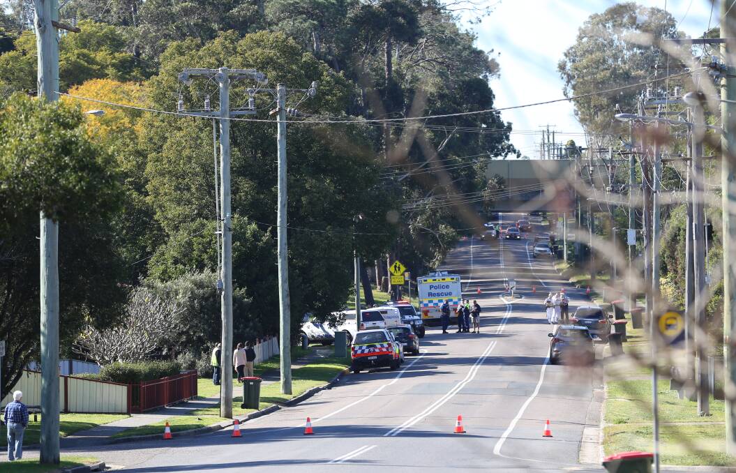Emergency services in Mount Hall Road, Raymond Terrace on Tuesday morning where a boy, 17, was hit and killed by a bus. Picture: Ellie-Marie Watts
