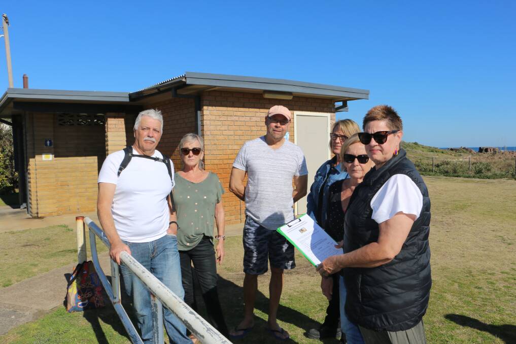 PETITIONERS: South Tomaree Community Association members are petitioning for the retention of the Ocean Avenue toilet block.