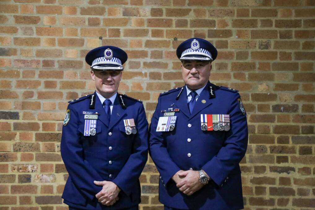 CHANGING OF THE GUARD: Detective Superintendent Chad Gillies handed command of the Port Stephens-Hunter Police District to Detective Superintendent Wayne Humphrey APM on Friday. Picture: Ellie-Marie Watts
