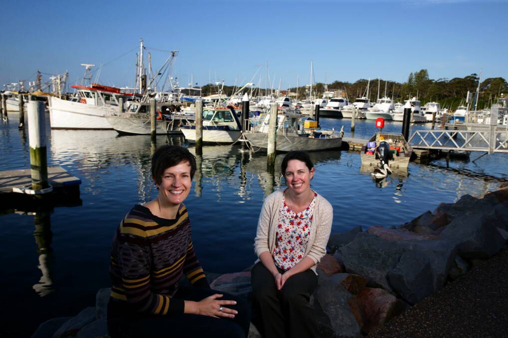 Kate Barclay and Michelle Voyer at the Nelson Bay Fisherman's Co-Op in September 2014 when they were conducting research for the UTS study Valuing Coastal Fisheries. Picture: Jonathan Carroll