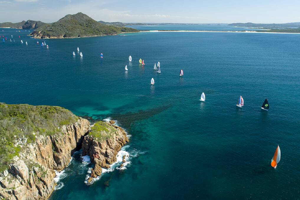 The Sail Port Stephens fleet passing Cabbage Tree Island. Picture: Hover UAV