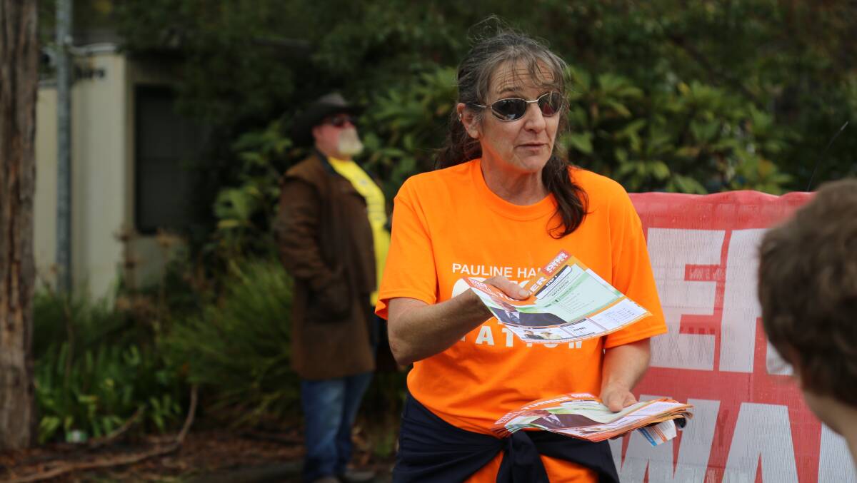 At Wirreanda Public School on Saturday, Annette Mason handed out voting information for Pauline Hanson's One Nation.
