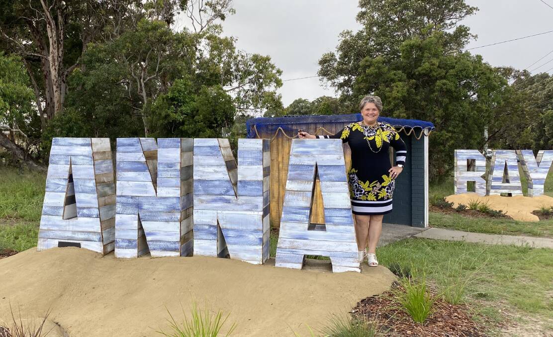 Paterson MP Meryl Swanson with the welcoming sign into Anna Bay.