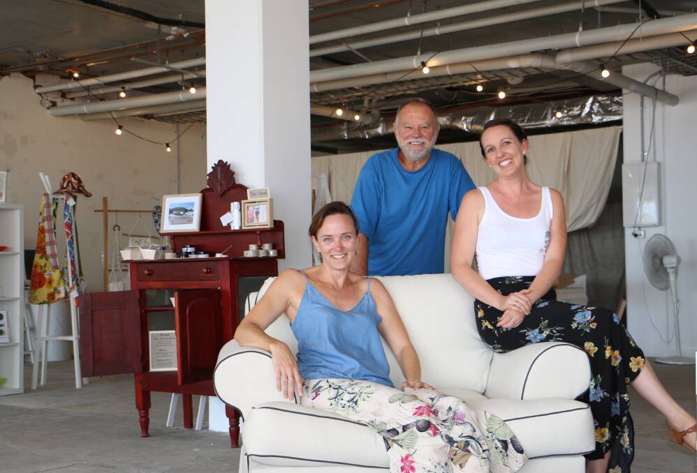 NEW SPACE: Anna Webster, John "Stinker" Clarke and Rhea Murray in the Port Stephens Artisan Collective shop at d'Albora Marina in Nelson Bay. Picture: Ellie-Marie Watts