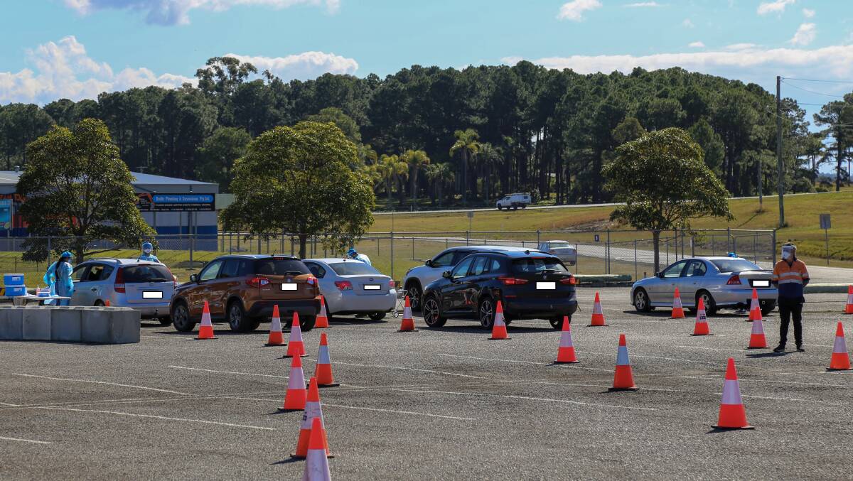 Cars lined up at the new Raymond Terrace drive-through COVID-19 testing clinic at Lakeside Sports Complex about noon on Tuesday, August 10.