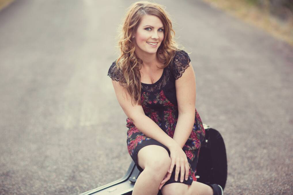 CLASS ACT: Solo singer and guitarist Kelly Hope will be entertaining at Soldiers Point Bowling Club from 7pm on Friday.