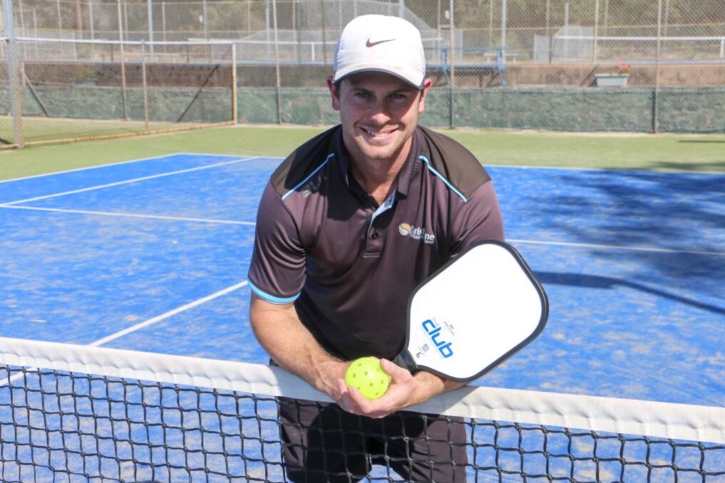 ANYONE FOR PICKLEBALL: Nelson Bay Tennis Club coach Blake Dennison with a pickleball bat and ball - a craze which is taking the tennis world by storm.