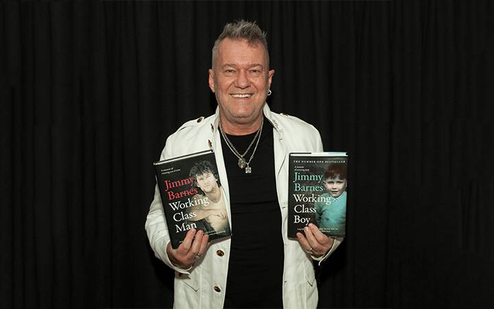 Jimmy Barnes with his two books. In Port Stephens last year, Working Class Boy was the top adult non-fiction book borrowed.