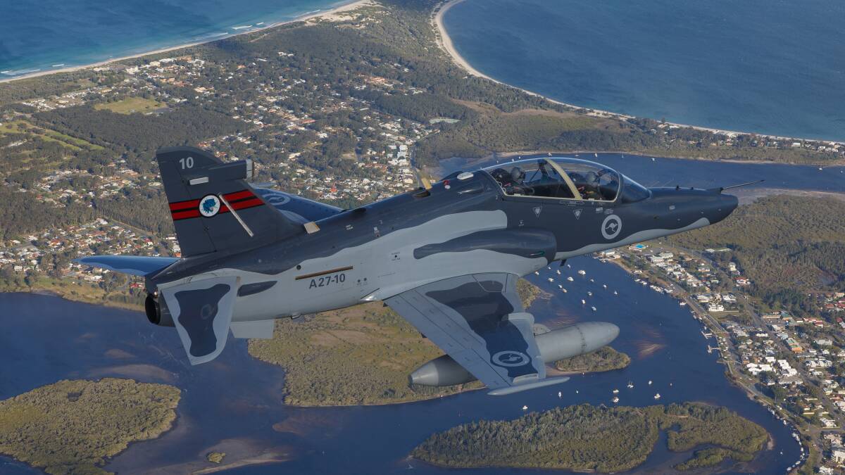 INFO: Hawk 127 lead in fighter A27-10 flying over Port Stephens. Register for the Defence Ready seminar at businessportstephens.com. Picture: SGT David Gibbs