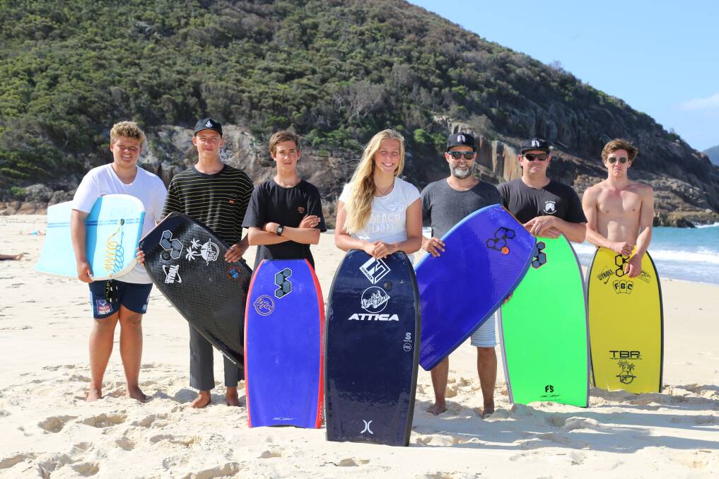GEARED UP: Port Stephens Bodyboarders Paddy O'Malley, 16, Nathan Price, Hayden Pisani, 16, Kaylah Pisani, Chad Pisani, Aaron Burke and James Cunningham at Box Beach.