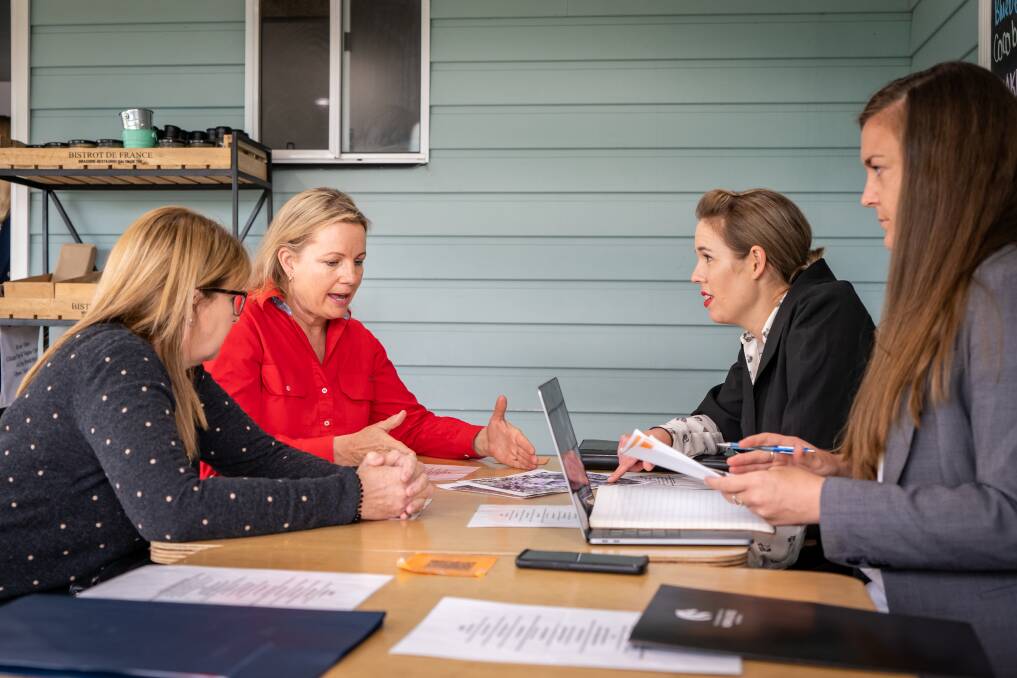 TALKS: Minister Sussan Ley (in red) speaking with Save Port Stephens Koalas campaigners Katrina Wark, Chantal Parslow Redman and Victoria Jack in Brandy Hill in September. Picture: Grant Gibbons