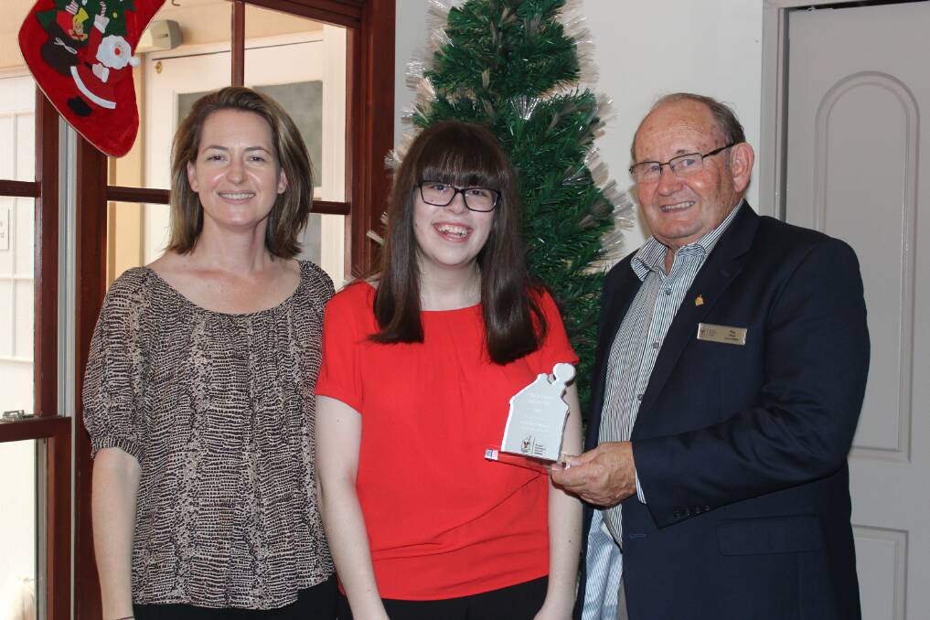 WINNER: Photo: Belinda Woolford (Executive Officer at Ronald McDonald House Westmead), Yasmine Turner and Ray Finn (Vice Chairman Ronald McDonald House Westmead Board). Picture: Supplied