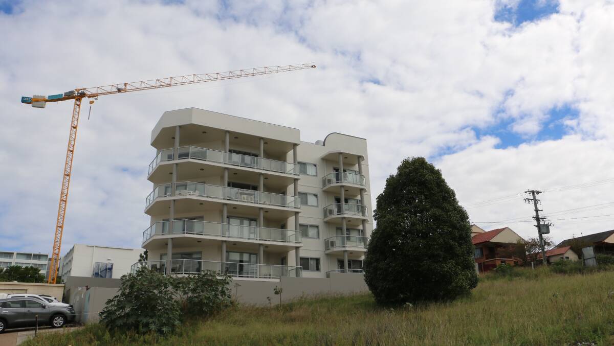 The crane that has towered over Nelson Bay for four years is due to swing back in action with the lodgement of a new development application. 