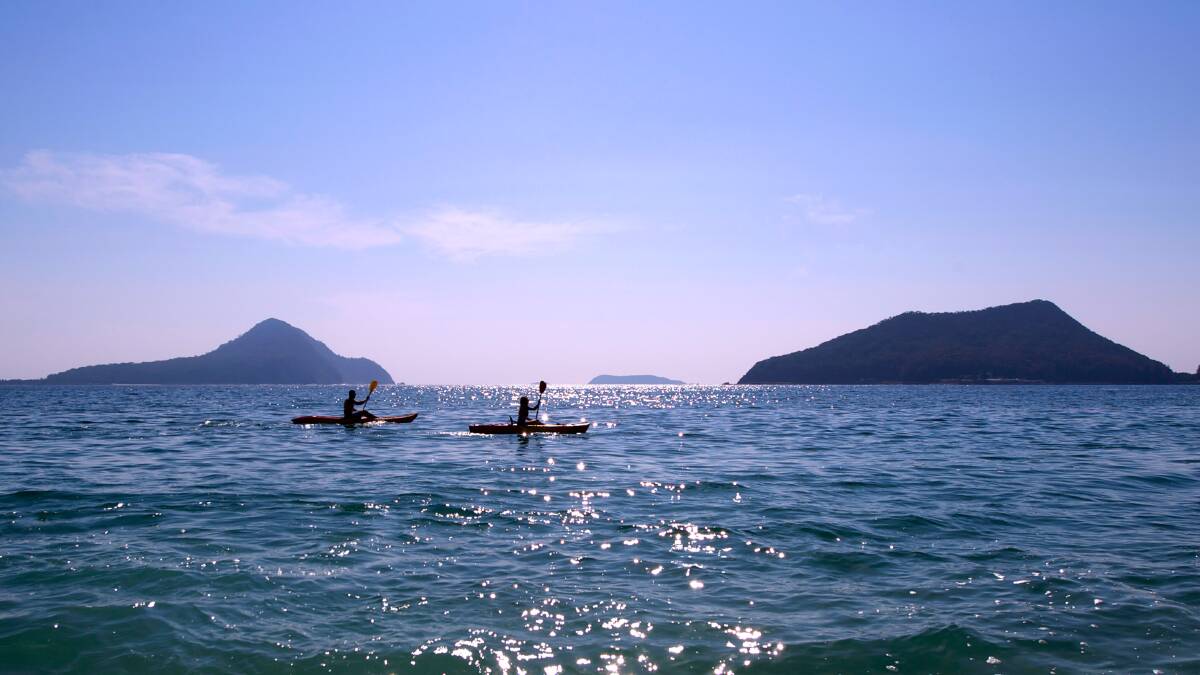 ENJOY MORE OF THE PORT: Kayakers at Shoal Bay, one of the 120 approved Port Stephens Council sites businesses can apply to trade from. Picture: Supplied