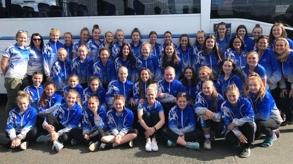 Port Stephens Netball Association's players, umpires and team officials before jumping on the bus to Sydney on Friday for the 2018 State Age Championships. Picture: Facebook/Port Stephens Netball Association 