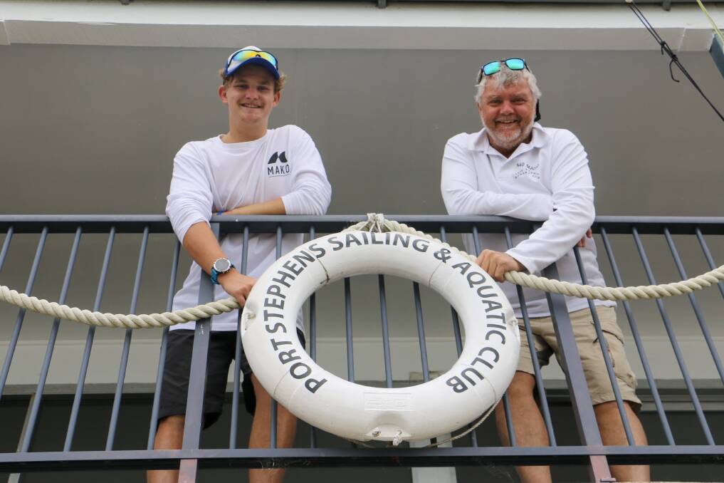DISAPPOINTED: Soldiers Point's father and son Greg and Marcus Busch pictured where it all started for the family - at the Port Stephens Sailing and Aquatic Club.