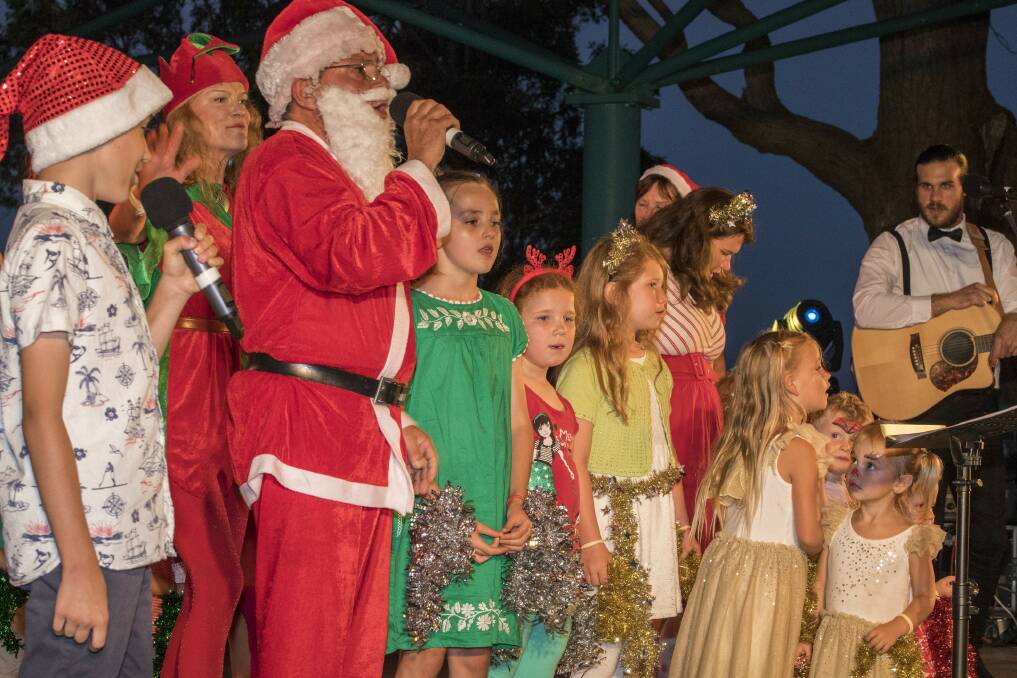 Photos from the Nelson Bay community carols. Pictures: Henk Tobbe