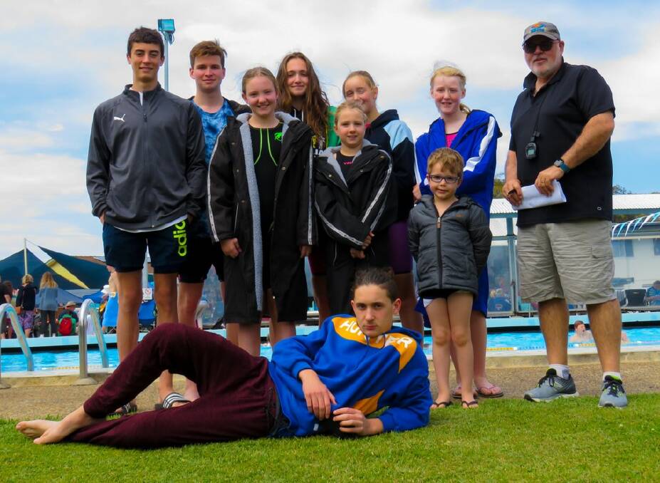 Stroud Seals Swim Club (back left to right) Robert Stanley, Tim Tatchell, Hosanna Gray, Angel Gray,  Angelica Francisc, Grace Gray, Manny Gray, Jade Smith and coach Michael Abel. Front, Raff Francisci.