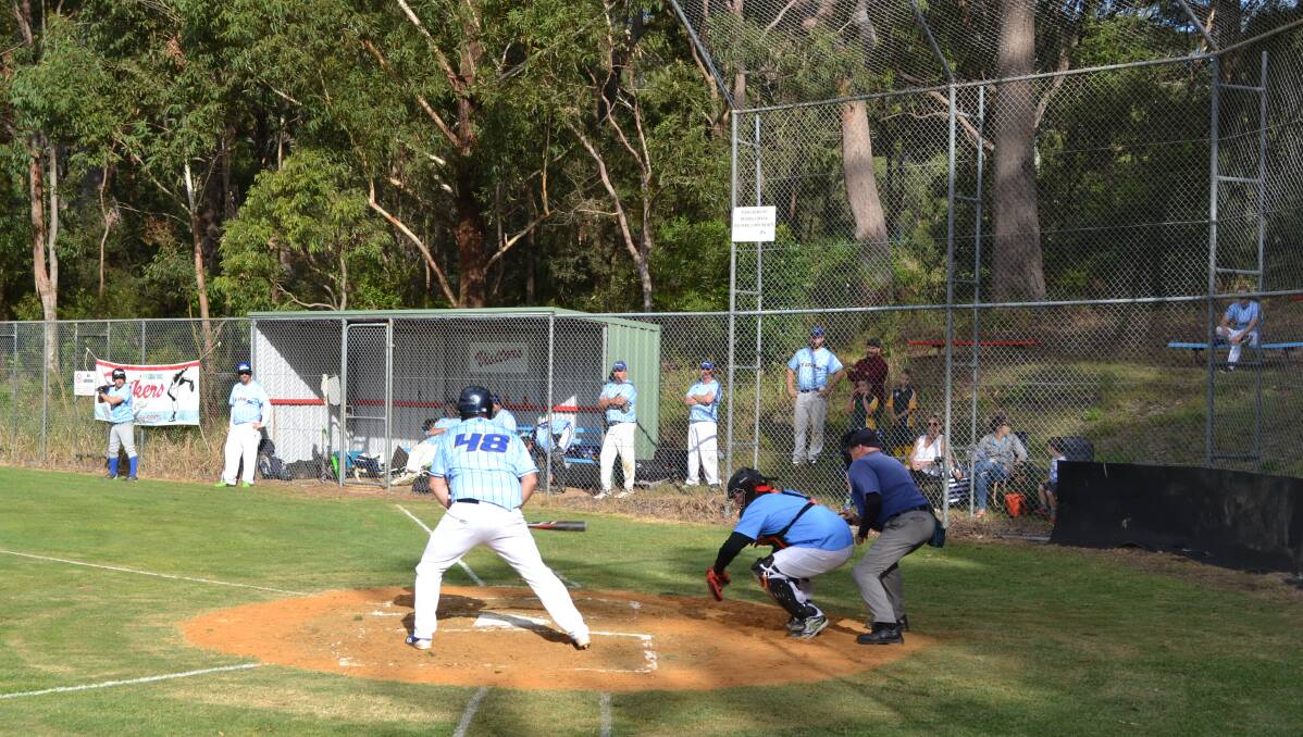 BATTER UP: Nelson Bay Strikers' fifth grade catcher Ross Turnbull behind a Seaham Storm batter at Tomaree Sports Complex on Saturday, April 27. The Strikers face Belmont on Saturday, May 4. Pictures: Bill Marshall