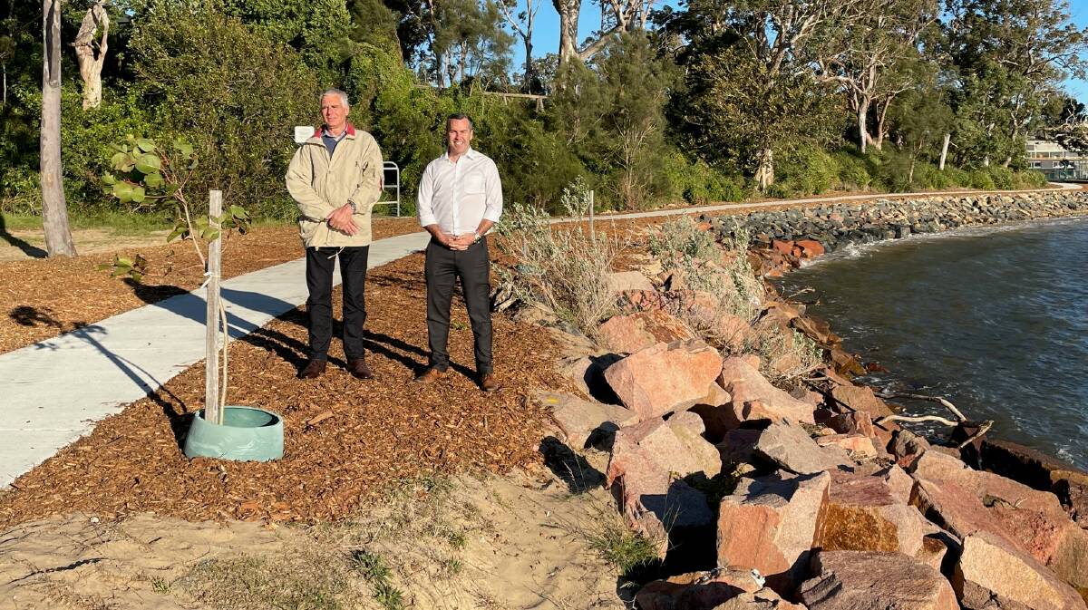 COMPLETE: Councillors John Nell and Ryan Palmer at the new Soldiers Point rock revetment wall. Picture: Supplied
