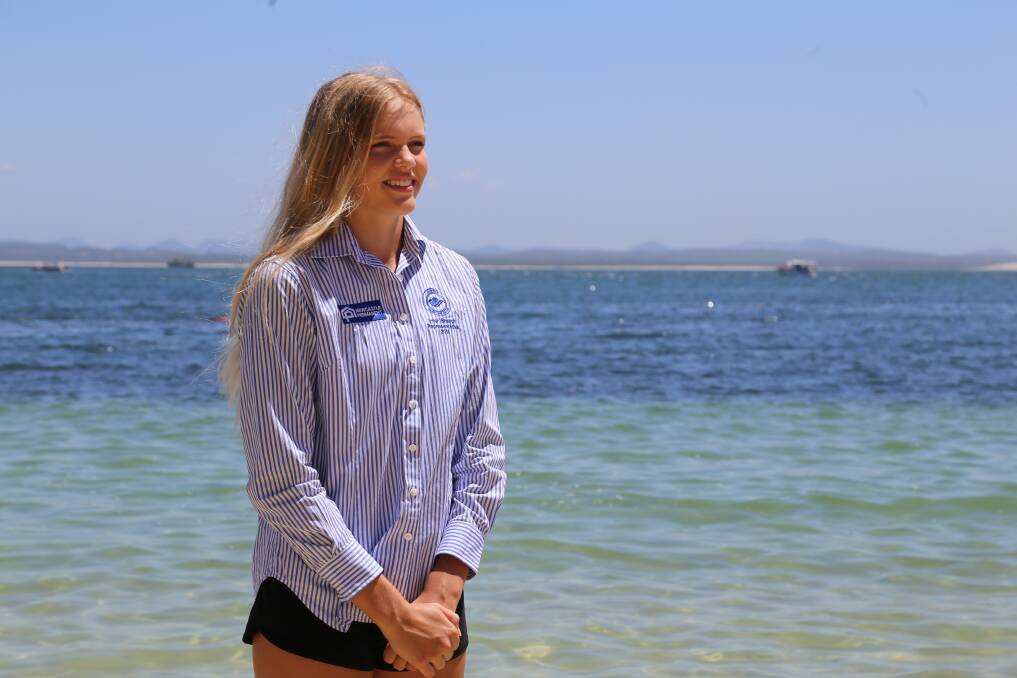 DEDICATED: Grace Hewitt, 15, at Dutchie's Beach wearing her Hunter Branch (surf life saving) uniform.