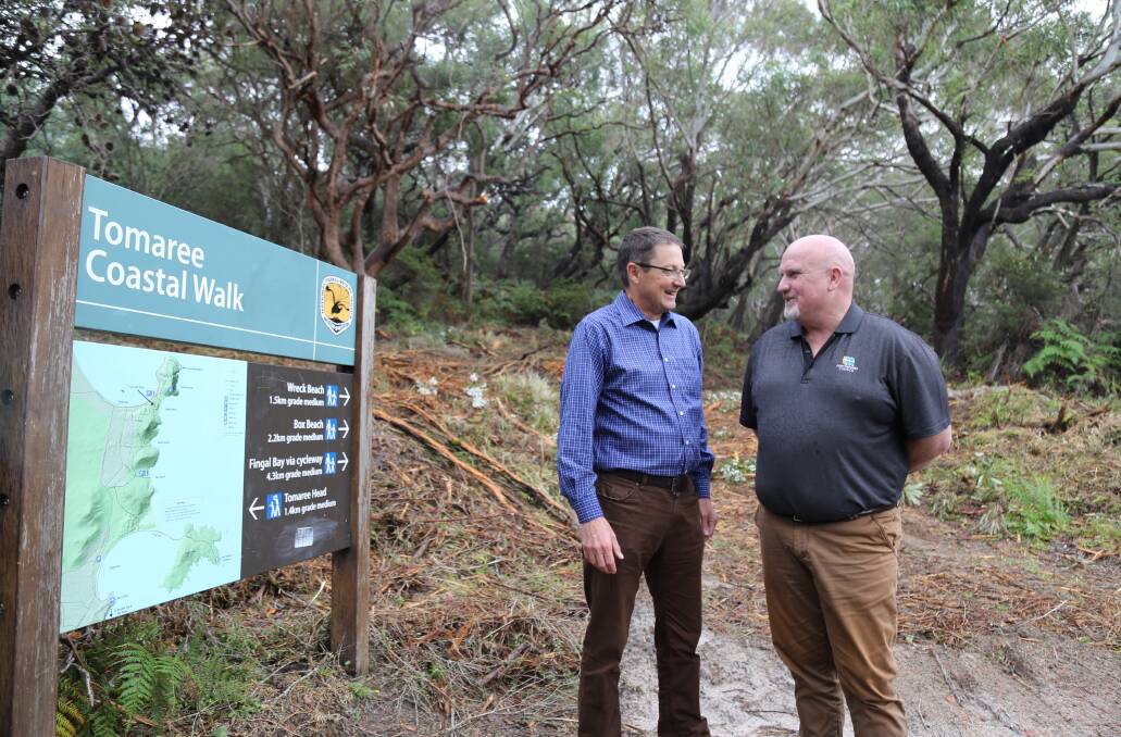 Past Parliamentary Secretary for the Hunter Scot MacDonald MLC and Port Stephens councillor Chris Doohan at the entry for the 23 kilometre Tomaree Coastal Walk. In June 2018, the pair announced the NSW Government would $6.7 million spend on upgrades to the walking trail. Picture: Ellie-Marie Watts