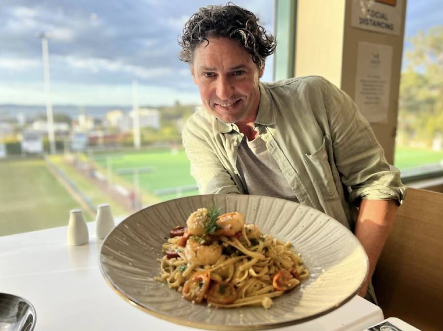 DELICIOUS: Colin Fassnidge with Nelson Bay Bowling and Recreation Club's Perfect Plate dish, a prawn and scallop linguine. Voting in the competition closes June 19.