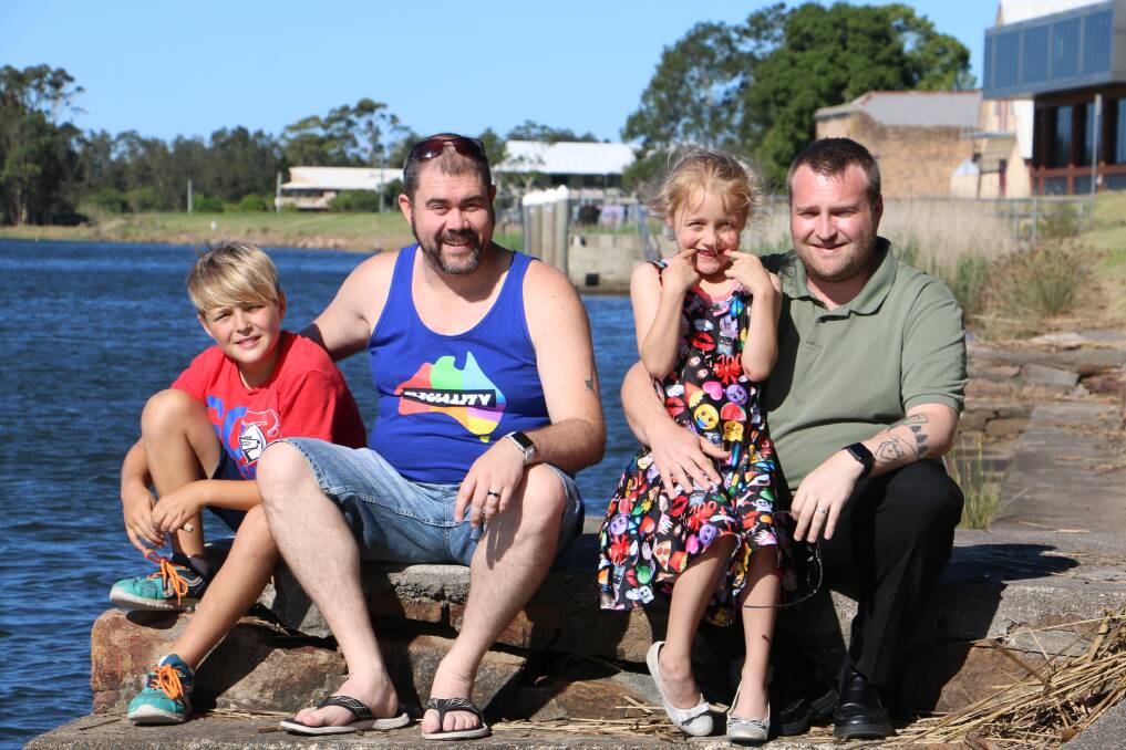 HISTORIC: Chris Baguley and Scott Dunn with their children Miles, 10, and Ivy, 6, in Raymond Terrace after the Marriage Amendment Bill was passed. Picture: Ellie-Marie Watts