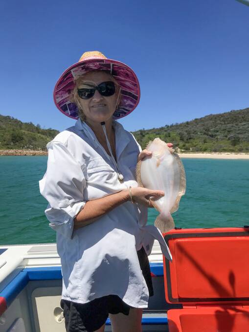 NICE CATCH: Lemon Tree Passage angler Deb Dall with her thumping flounder caught off the Outer Light.