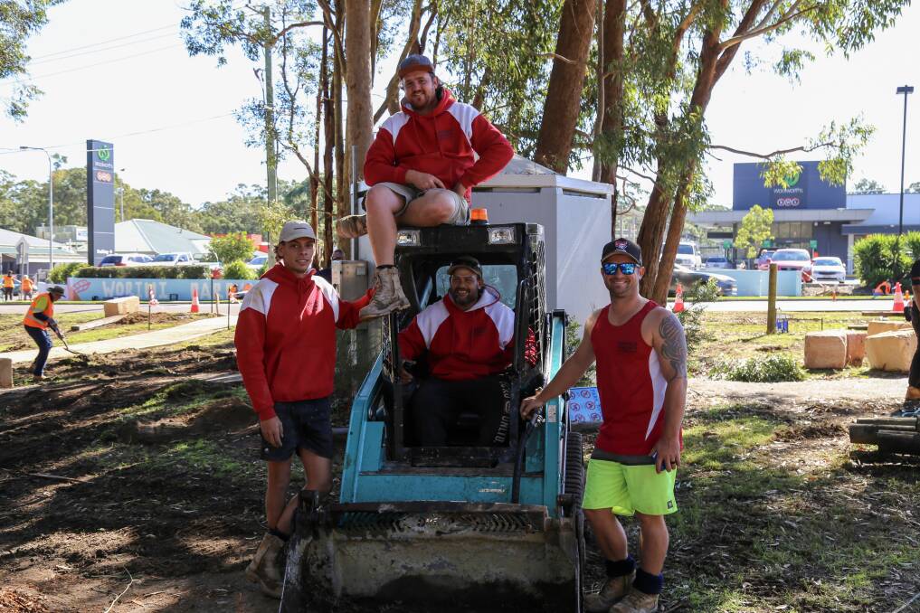 TEAM: Jarad Ashpole (right) with his Ashpole Concrete and Constructions crew in Lions Park on Friday. The crew have been heavily involved in the Medowie 7-Day Makeover. Picture: Ellie-Marie Watts