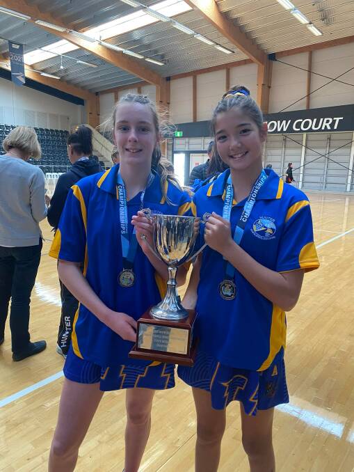 Two Nelson Bay netballers were part of the Hunter team that won the NSW Primary Schools Sports Association netball championships in July. Pictures: Supplied