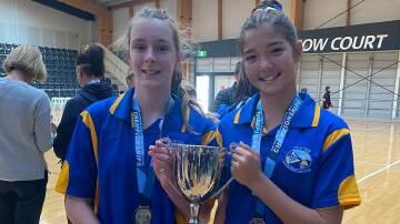PROUD: Nelson Bay Netball Association players Mackenzie Bohan and Bowey Manning were part of the Hunter team that won the NSW Primary Schools Sports Association netball championships in July.